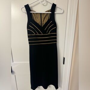 Stylish V-neck black dress!  Size 2